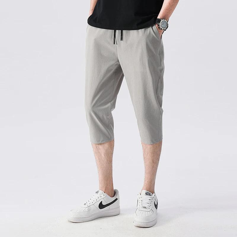 Korean Version Men'S Summer Slim Fit Small Foot Sports Casual Pants Boys' Ice Silk Quick Drying 7-Point High Elastic Shorts - Image 3